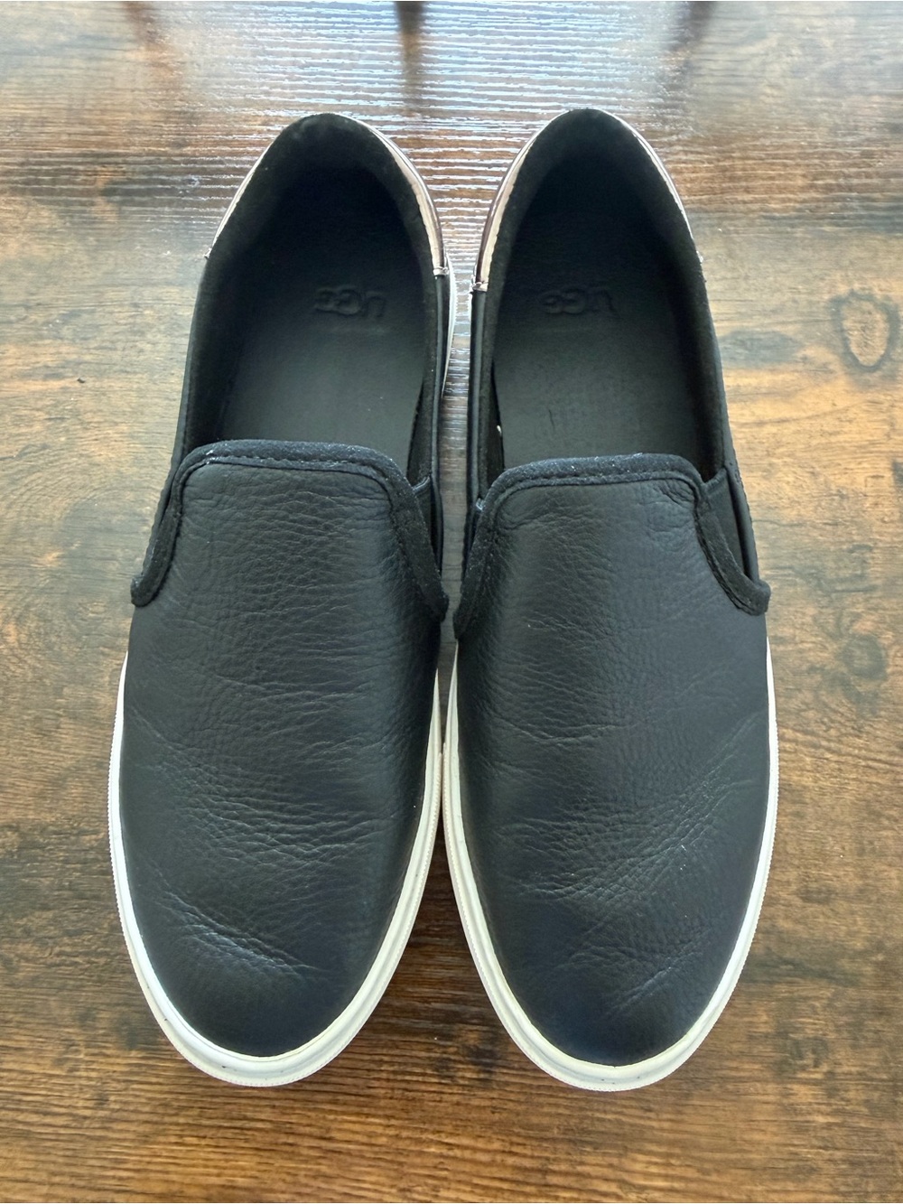 UGG Men's Black Slip-On Leather Sneakers with White Outsole